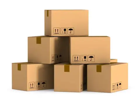 Stacked export cartons with handling symbols for bulk distribution